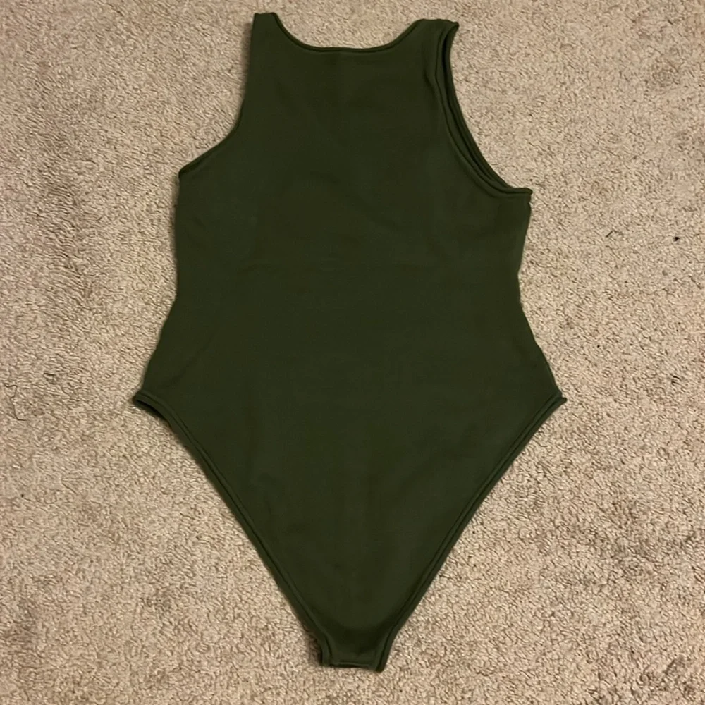 Free People ribbed olive green sweater material high neck bodysuit Size …‎